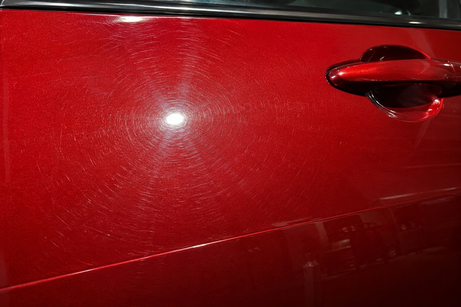 Swirl marks on red car paint — paint correction Melbourne